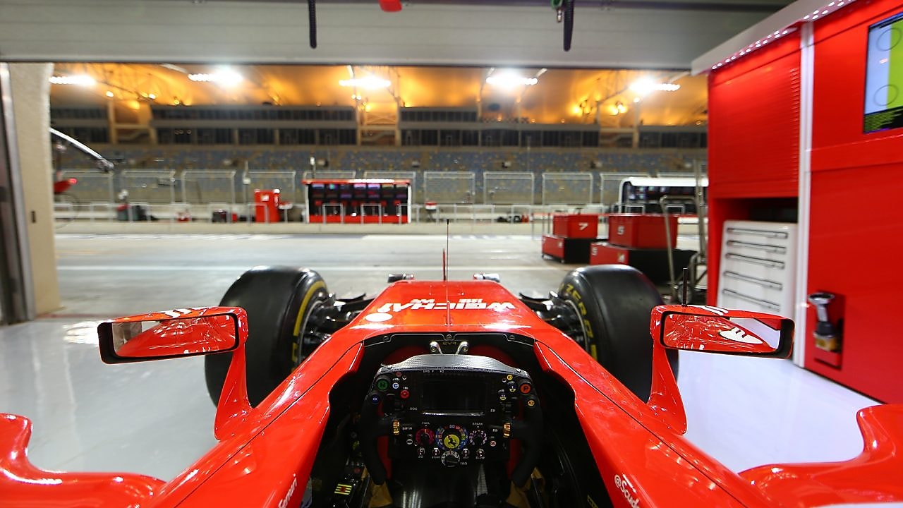 Scuderia Ferrari F1 car in garage