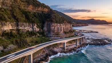 Cars travelling on the Sea Cliff Bridge in the Illawarra region, Australia