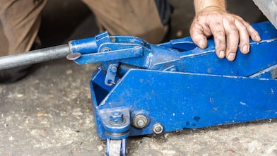 Man with car jack