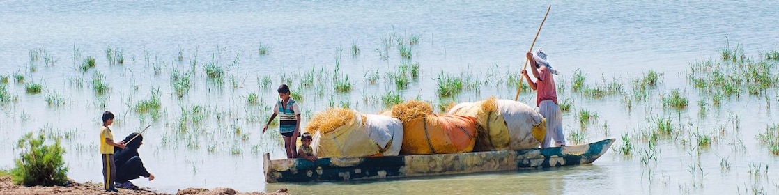 Local people on the Yabani Canal in the South of Iraq