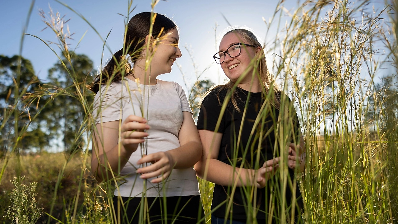 Students from the Future Makers program with grass