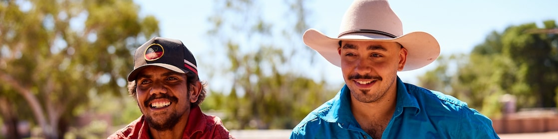 Past participants in the Rise Up To Work program laughing