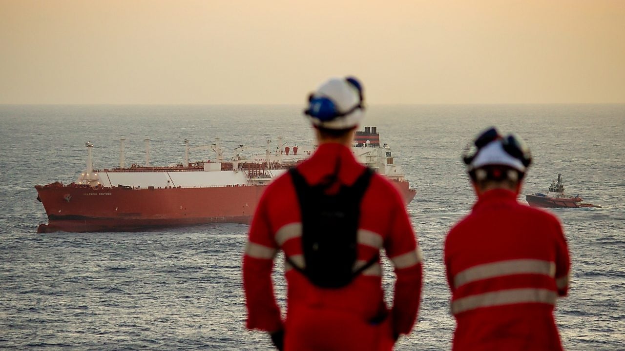 Workers arranging goods in supply warehouse